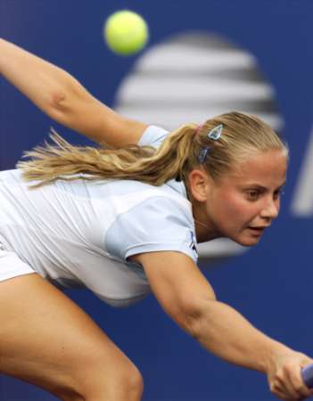 Jelena Dokic of Yugoslavia tries in vain to hit a backhand return during he...